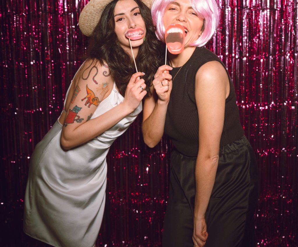 full-shot-women-posing-together-event